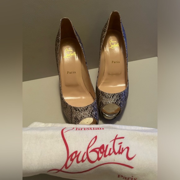 CHRISTIAN LOUBOUTIN
Animal Print Glitter Accents Pumps - Picture 2 of 13